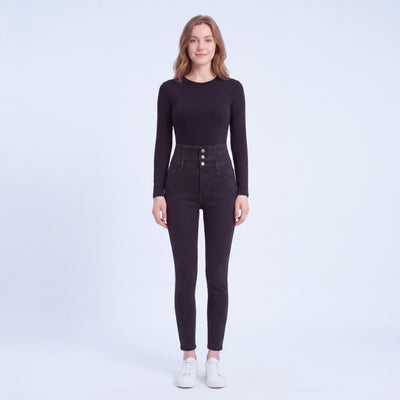 Model wearing Stella fleece-lined high-rise jeans in Black, full length