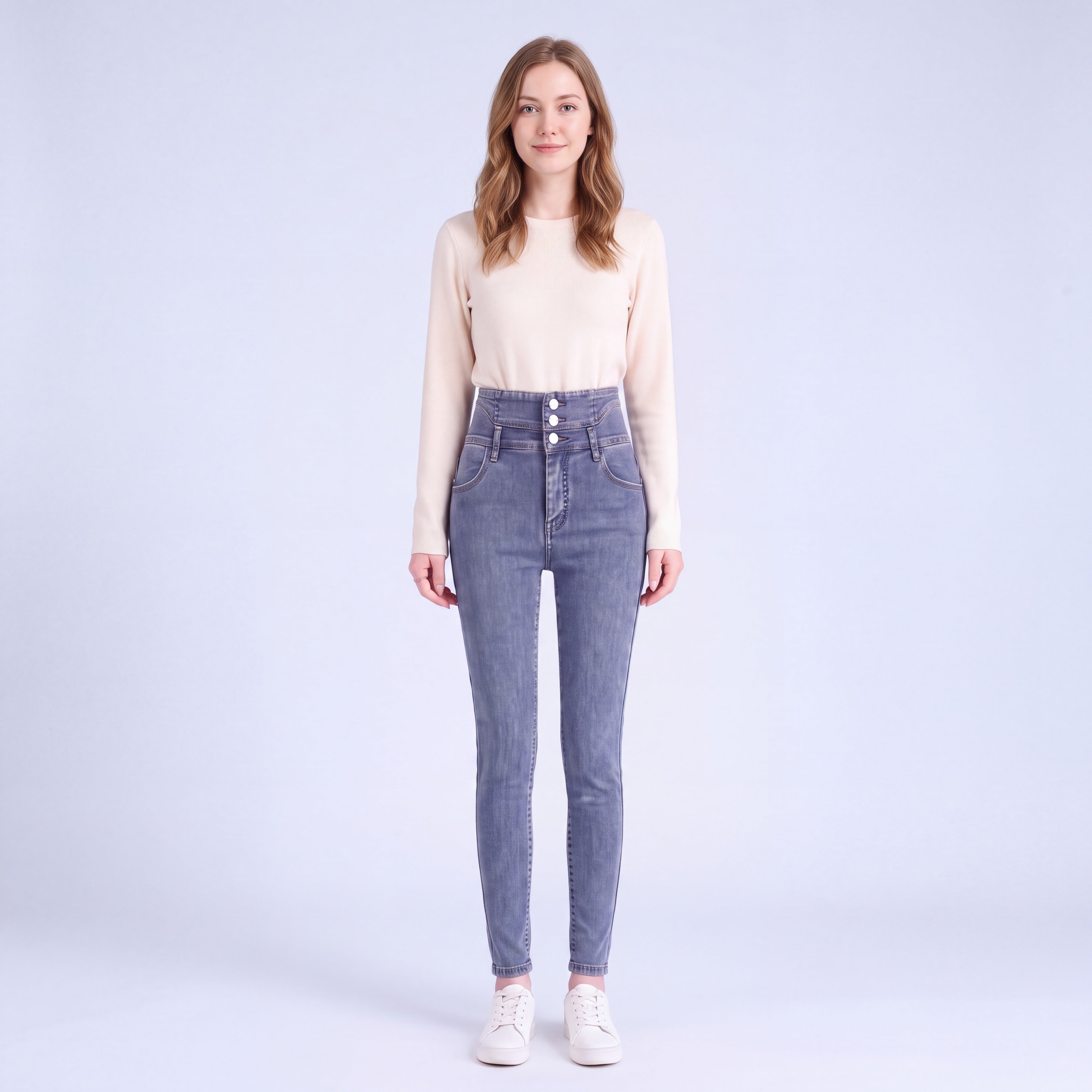 Model wearing Stella fleece-lined high-rise jeans in Vintage Blue, full length